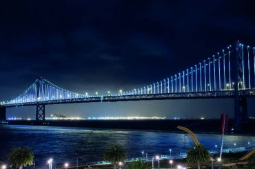 bay bridge view at night illuminated by digital art installation interact landmark software intro